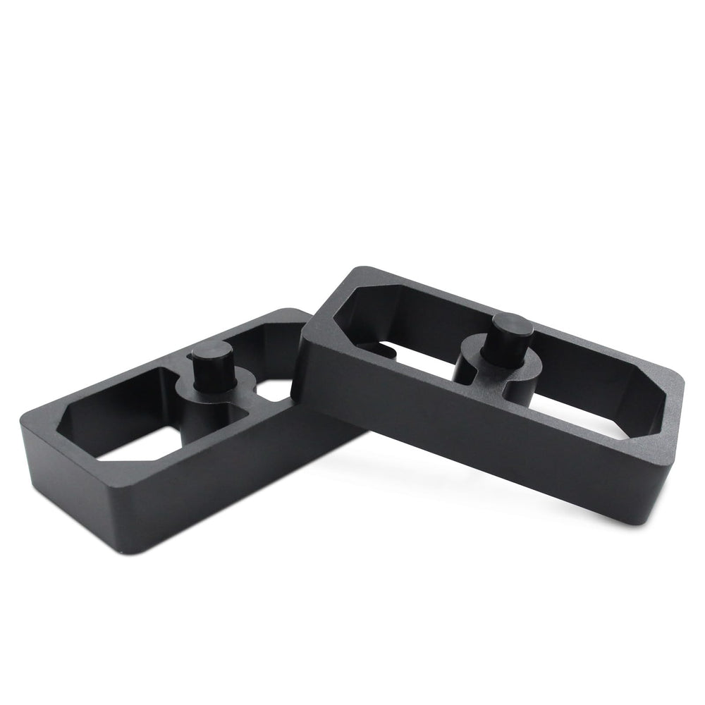 LVOUP lowering block beside ruler showing one inch drop for fitment
