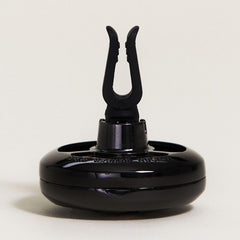 MAISON BERGER gun metal clipped on vent demonstrating secure, rattle-free grip