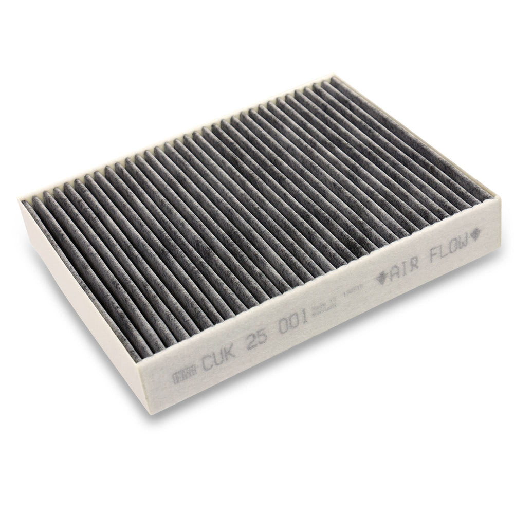 MANN-FILTER installed in vehicle cabin filter slot for easy replacement