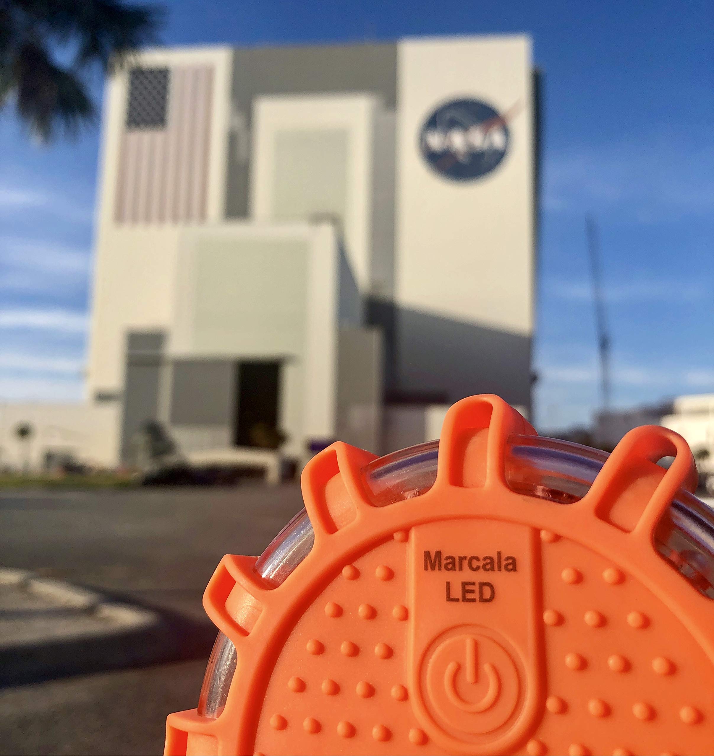 Marcala flare next to hand showing compact size and easy handling