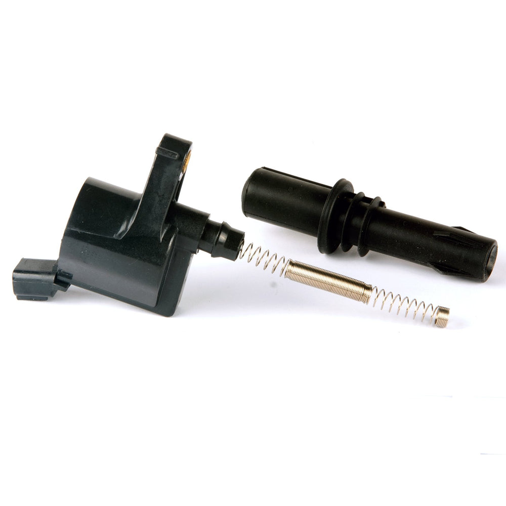 MAS spark plug in hand next to finger for scale, conveying thread size and handling
