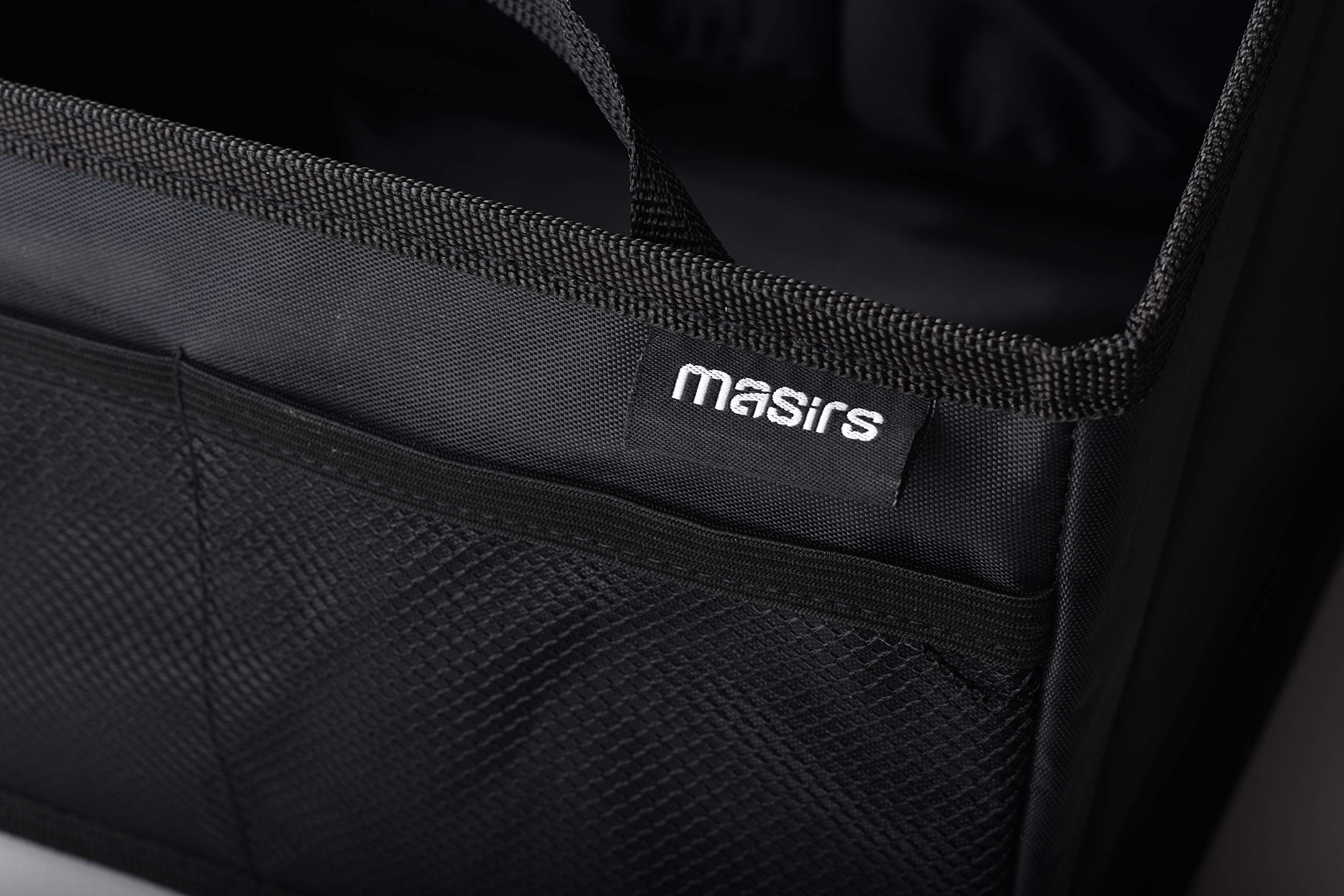 Masirs organizer placed in backseat holding snacks and toys for easy reach
