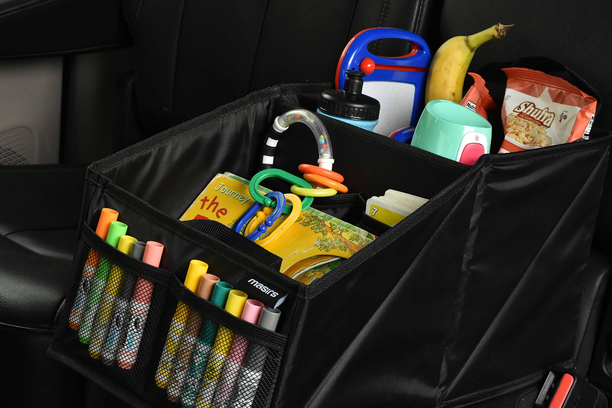 Masirs organizer on car floor next to shoe showing scale and capacity