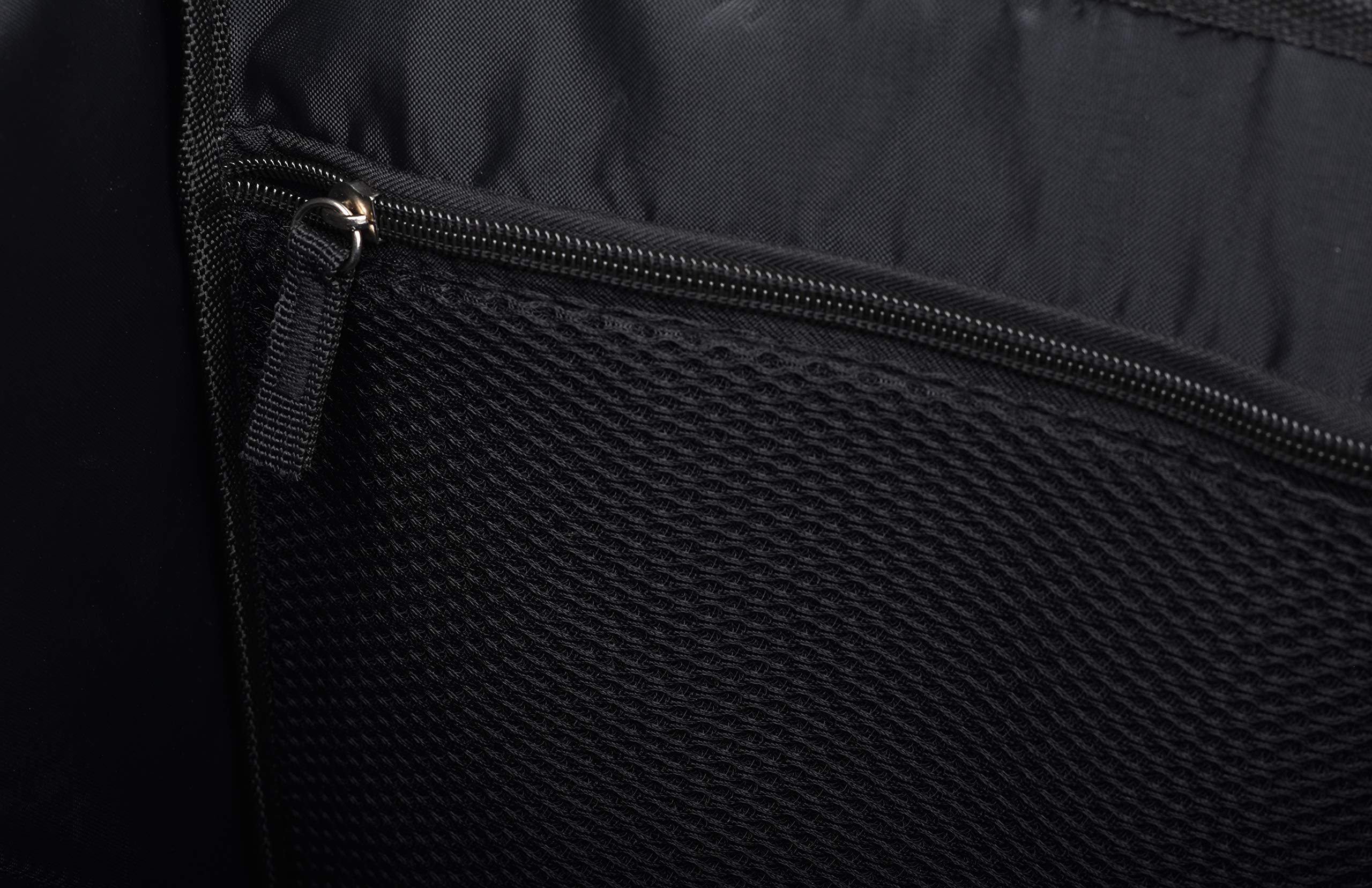 Masirs zippered pocket detail protecting valuables and small accessories