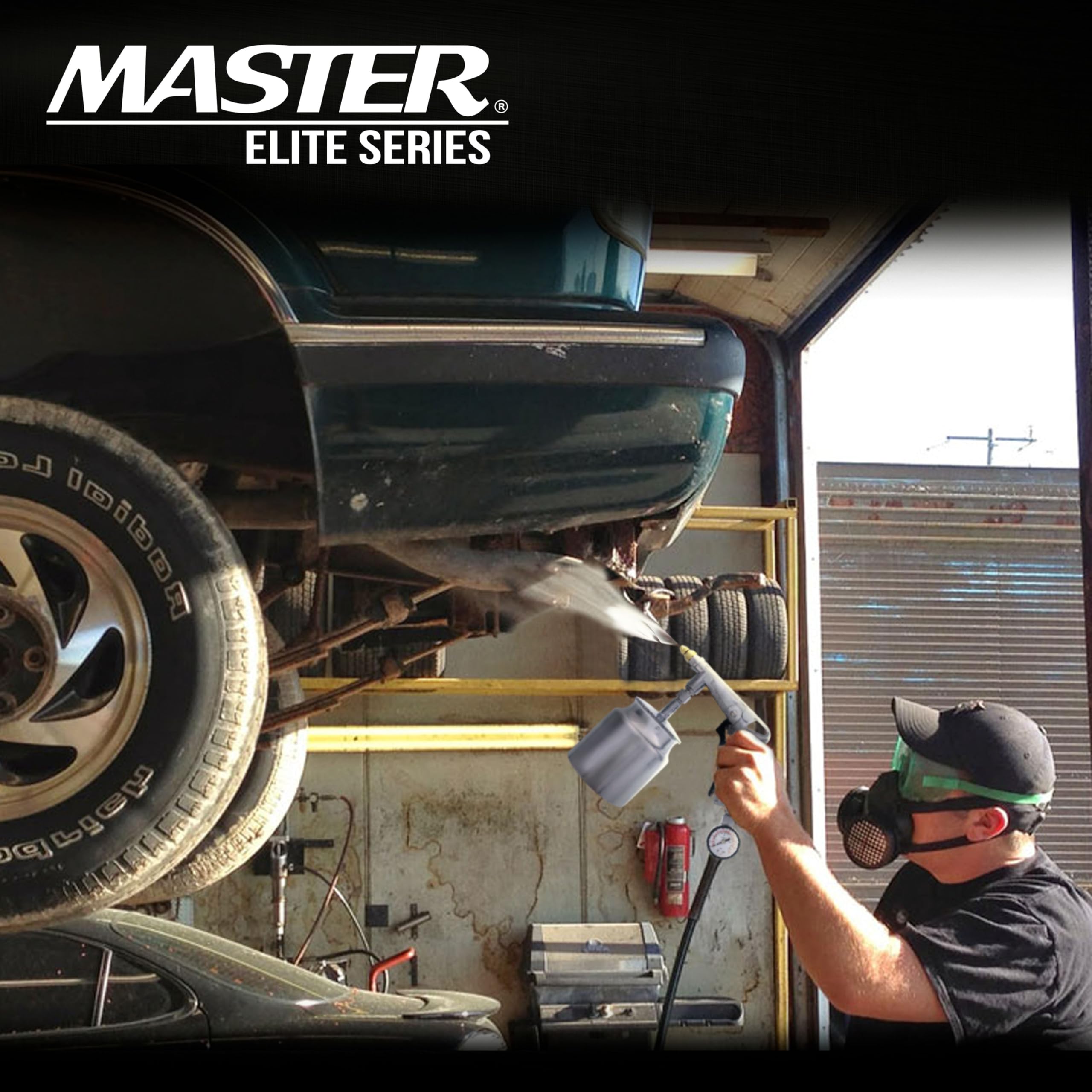 Master Airbrush applying undercoating to truck underbody, protecting against corrosion