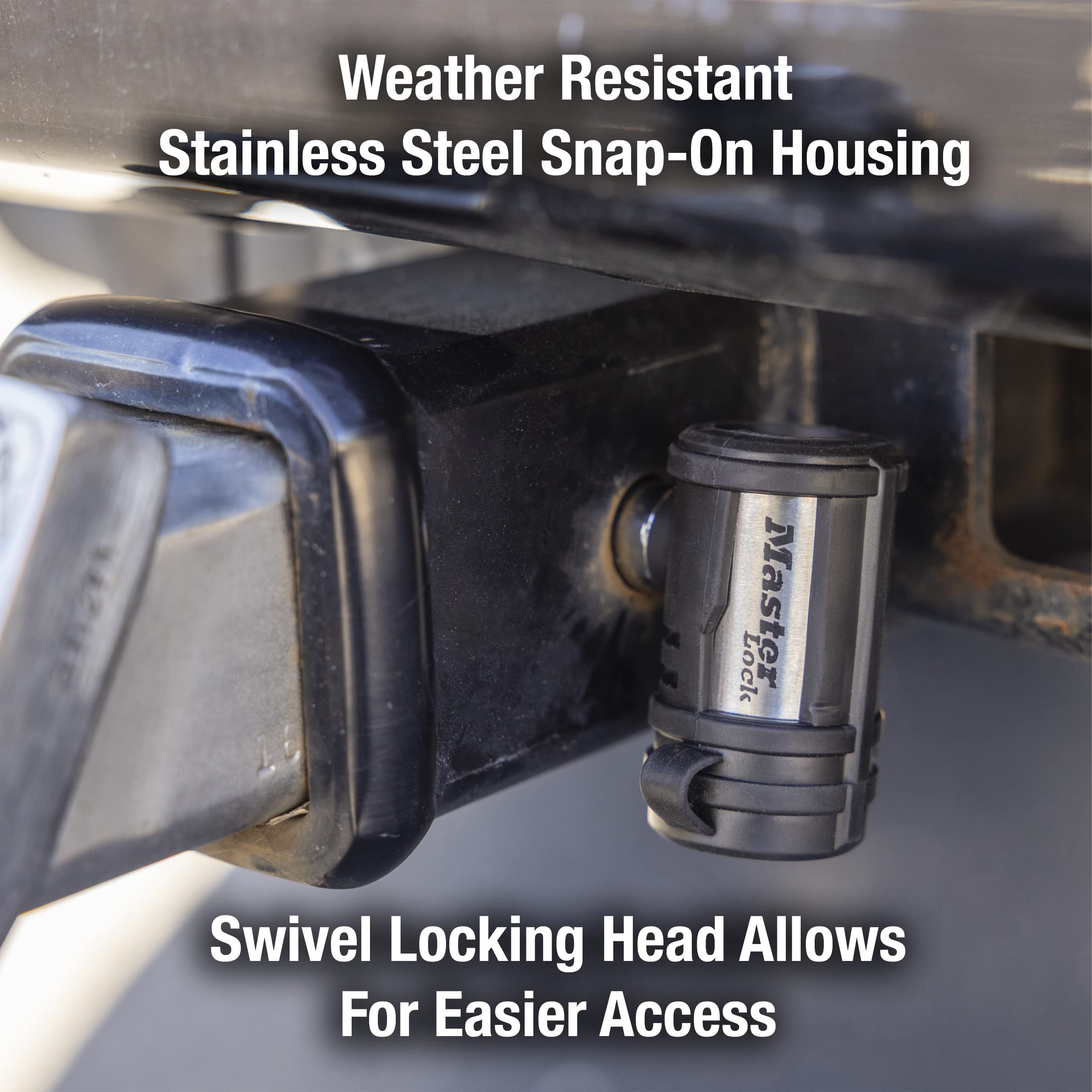 Master Lock coupler lock fitted on trailer latch showing snug fit and tamper-resistant profile