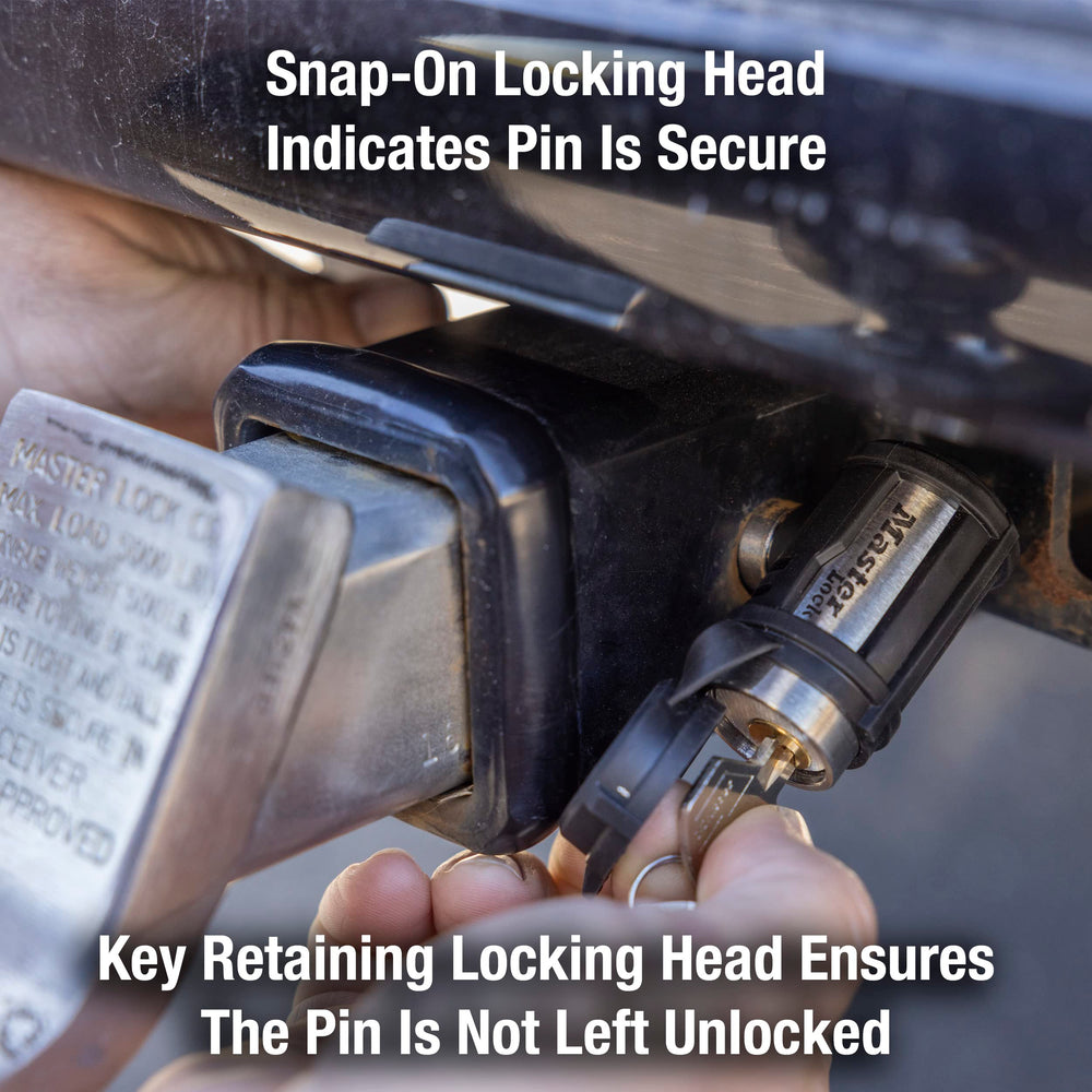 Master Lock receiver lock installed in trailer receiver demonstrating secure fit and quick quarter-turn lock