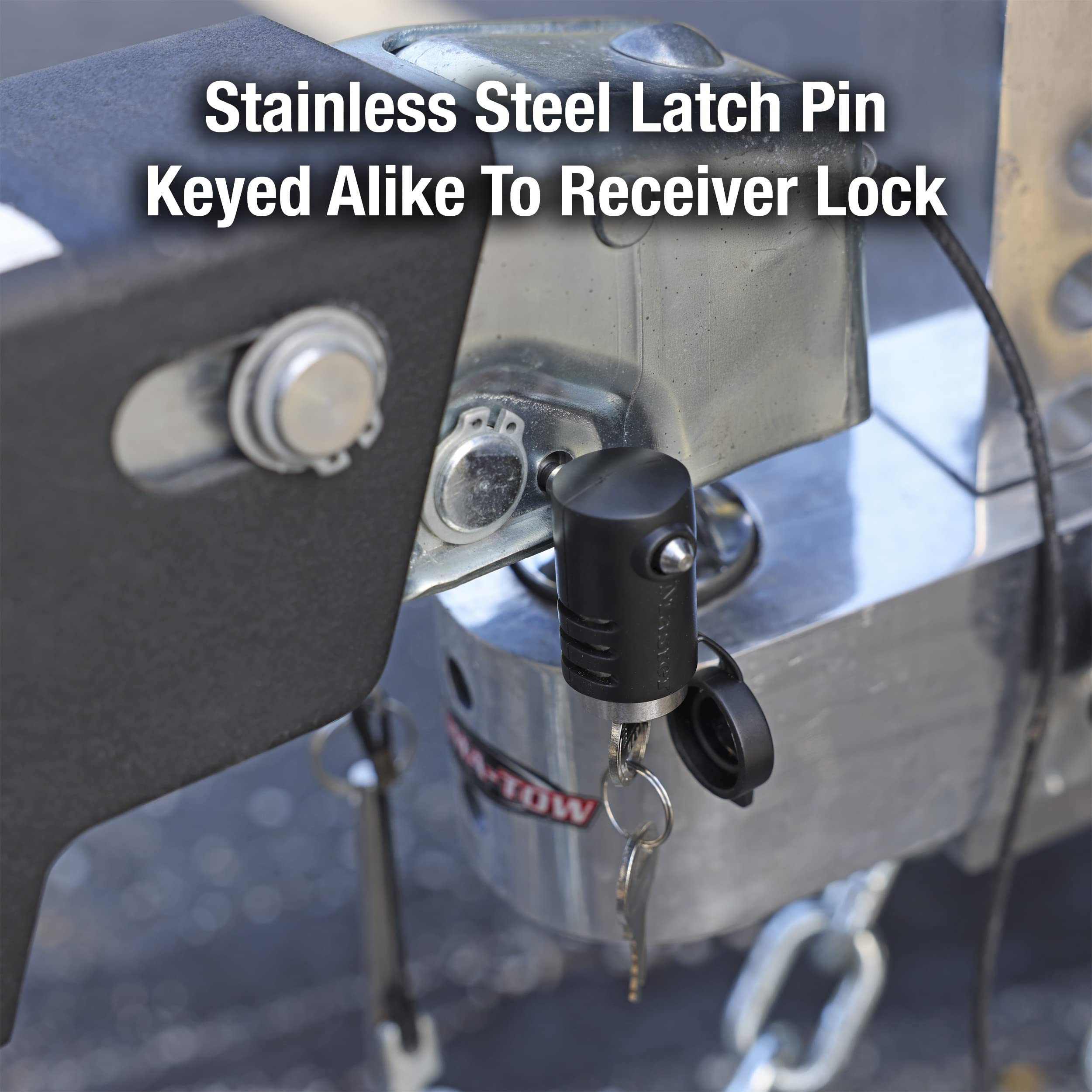 Master Lock lock held in hand for scale to show compact size and easy handling