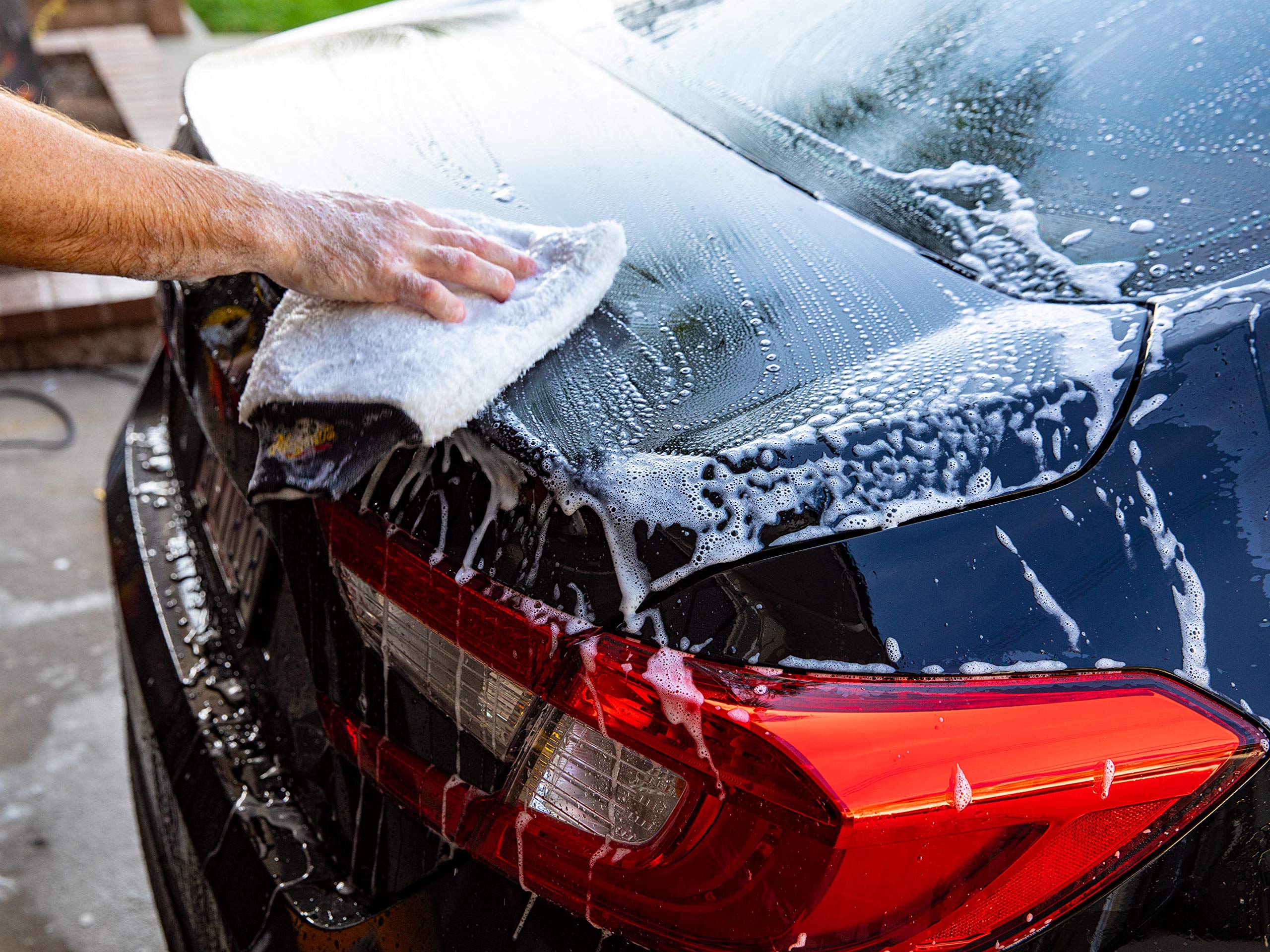 Meguiar's D111 next to a measuring cup to show one-gallon scale