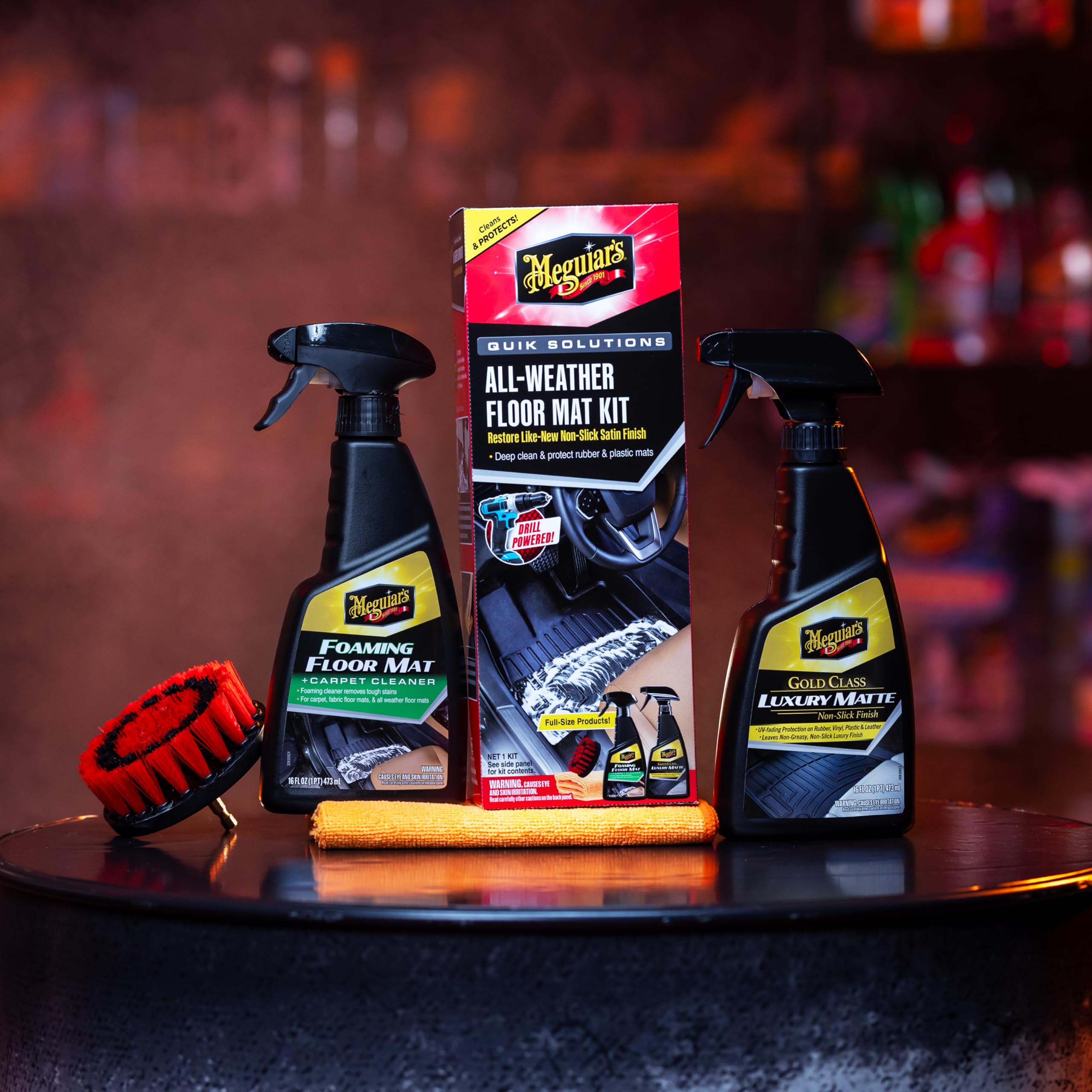 Meguiar's kit staged in a car interior conveying professional results and maintained cabin appearance