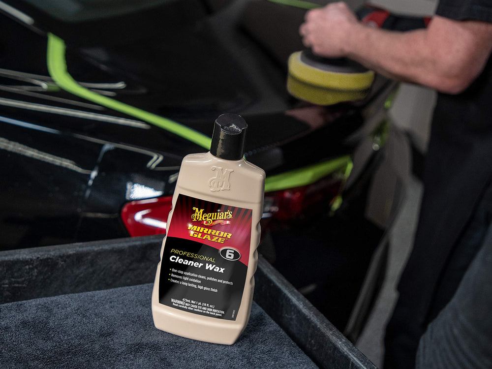 Meguiar's dual-action polisher applying M06 giving efficient gloss results