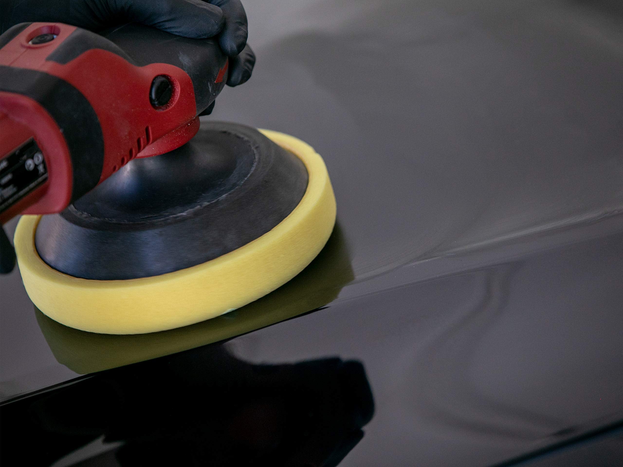 Meguiar's 16oz bottle next to measuring cap for size and usage clarity