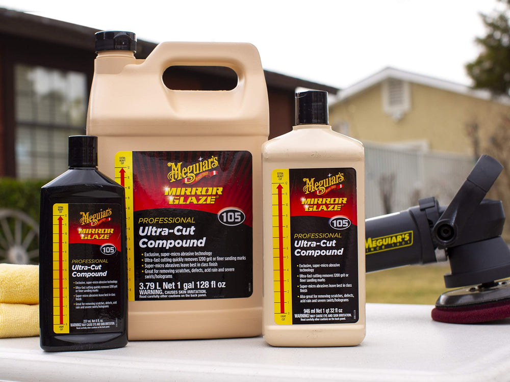 Meguiar's M105 next to M205 polishing bottle illustrating the two-step refining process