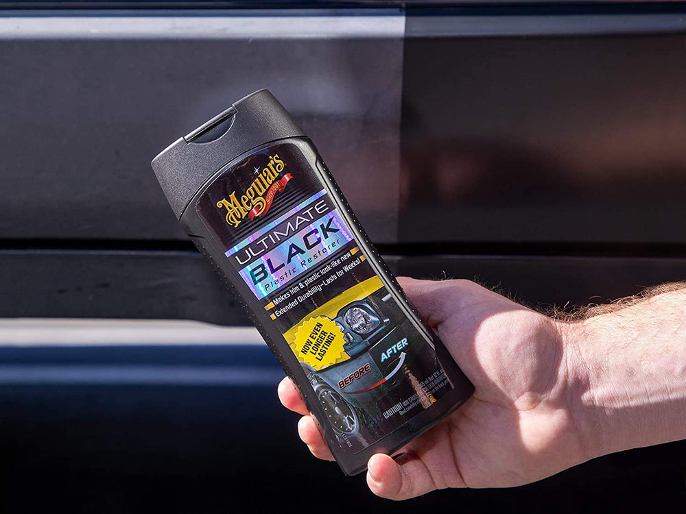 Meguiar's before and after on side molding demonstrating visible renewal