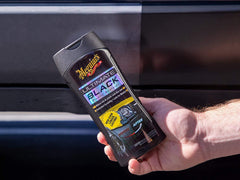 Meguiar's before and after on side molding demonstrating visible renewal