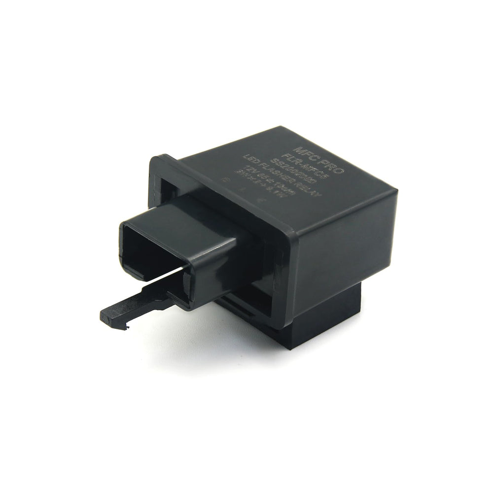 MFC PRO relay next to ruler to show compact 30x30x18.5mm size advantage