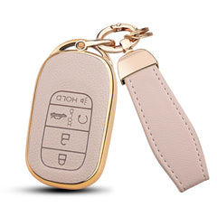 MILD EAST cream front view showing elegant leather finish and button access
