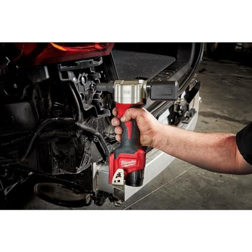 Milwaukee 2550-20 held in hand showing scale and one-handed control benefit