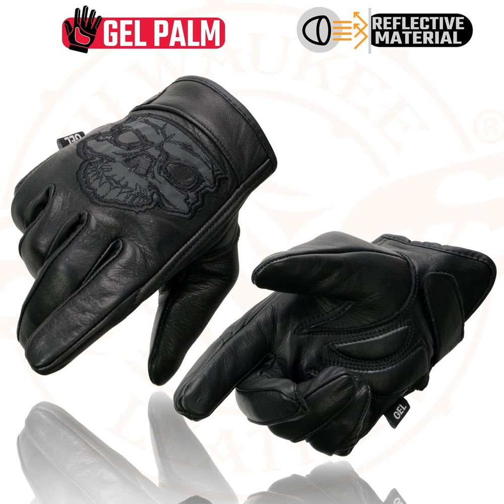 Milwaukee Leather glove next to hand showing X-Large size scale