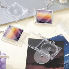 Misdary mini CD case attached to a bag keyring for portable access