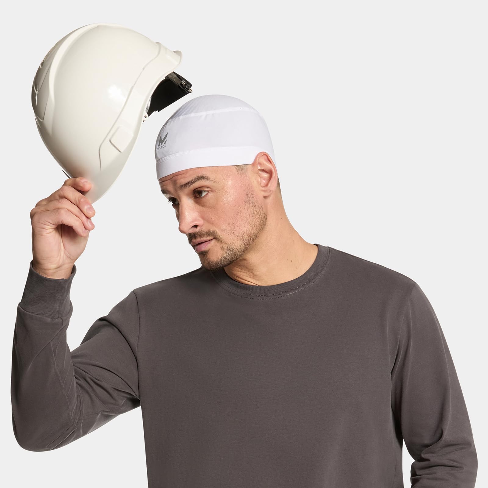 MISSION product label and UPF50 tag showing sun protection benefit