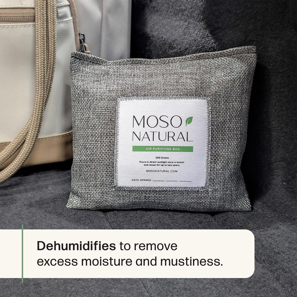 MOSO NATURAL bag held in hand showing compact size and portability benefit