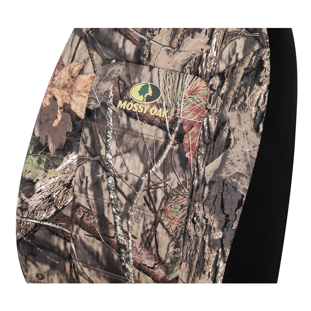 Mossy Oak headrest cover detail showing stitching and airbag-compatible seam safety benefit