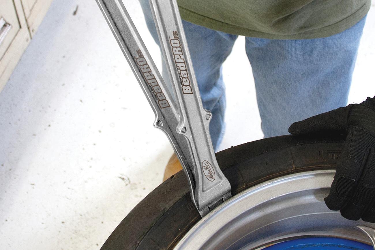 Motion Pro close-up of forged steel foot showing hardened edge for clean bead break