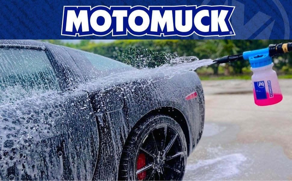 Motomuck foam gun in driveway cleaning a vehicle demonstrating at-home professional-grade foam