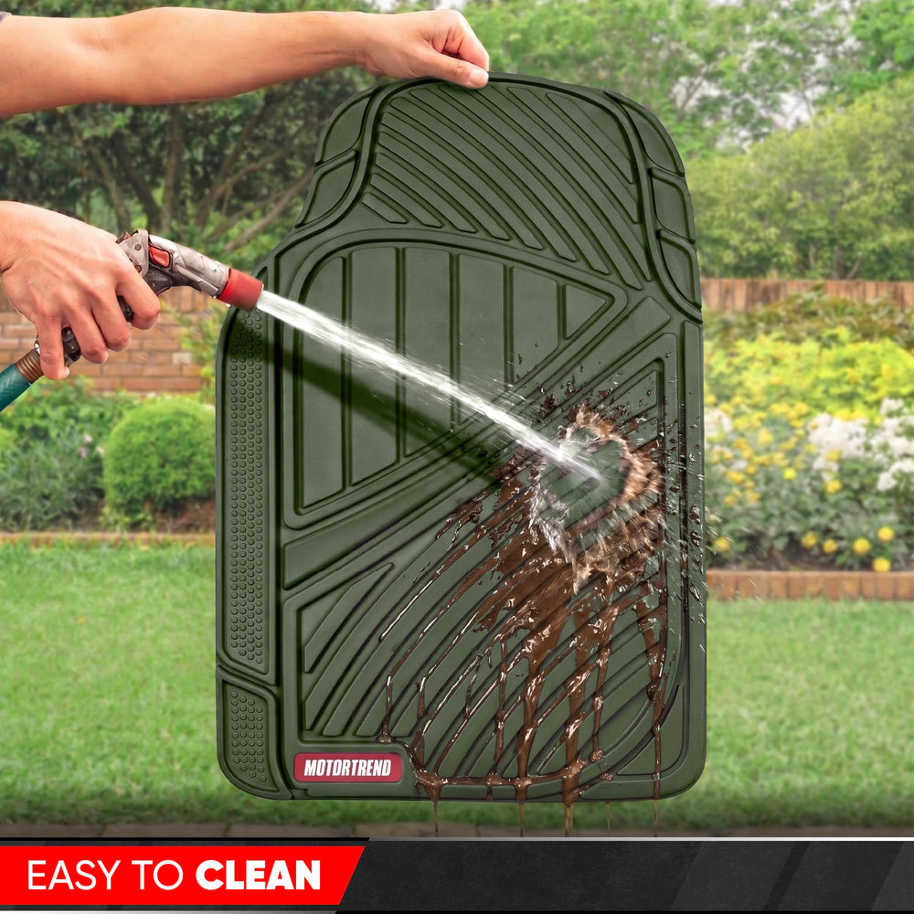 Motor Trend mat being hosed off for fast, easy cleaning