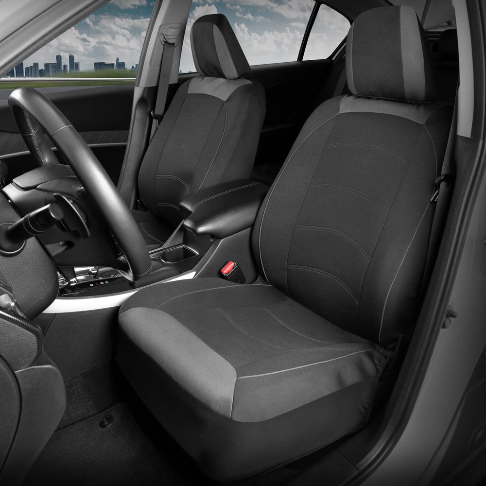 Motor Trend headrest cover close-up showing stitched accents and refined piping