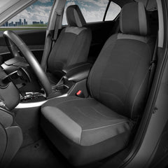 Motor Trend headrest cover close-up showing stitched accents and refined piping