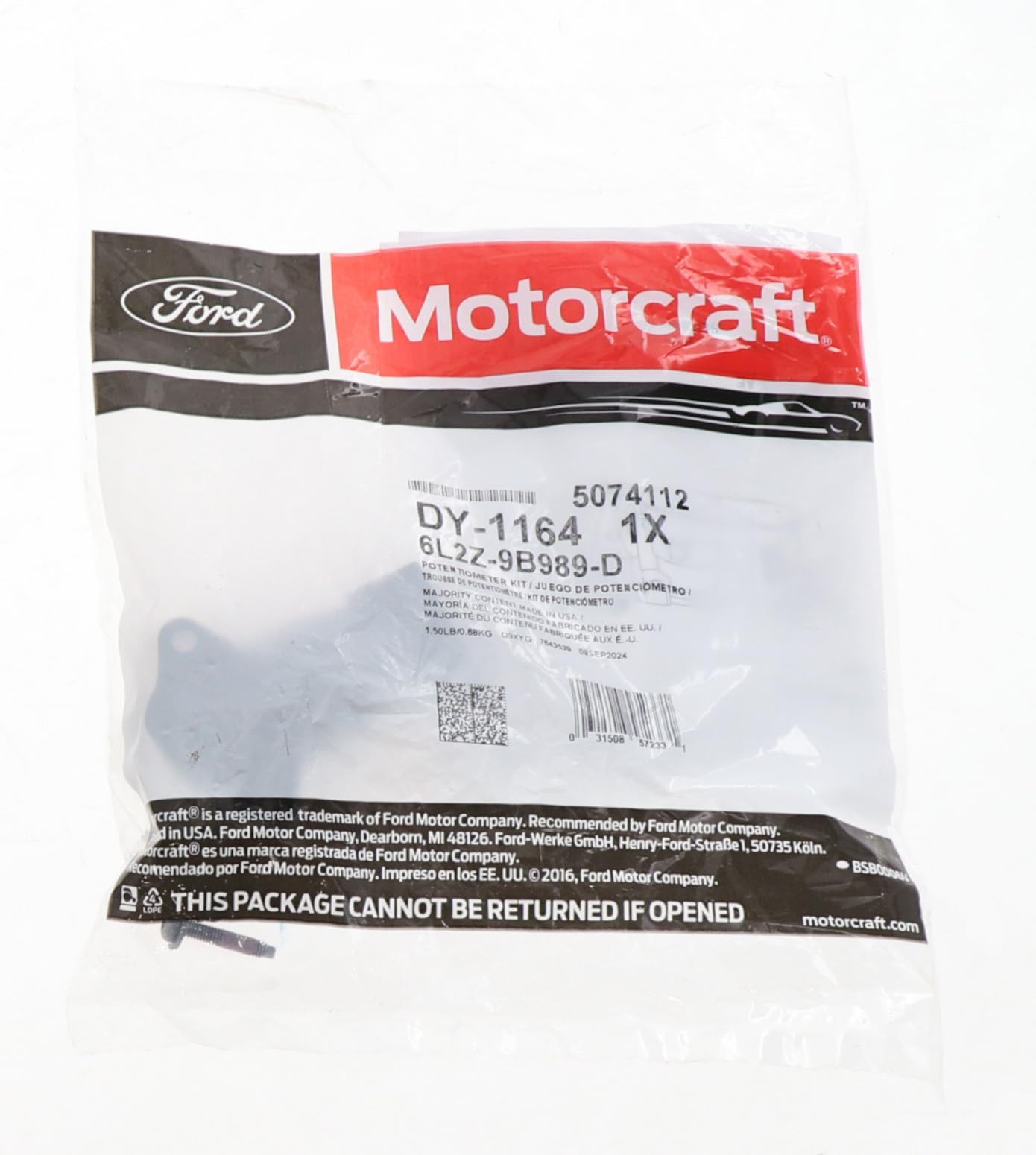 Motorcraft DY1164 beside ruler showing compact size for easy replacement