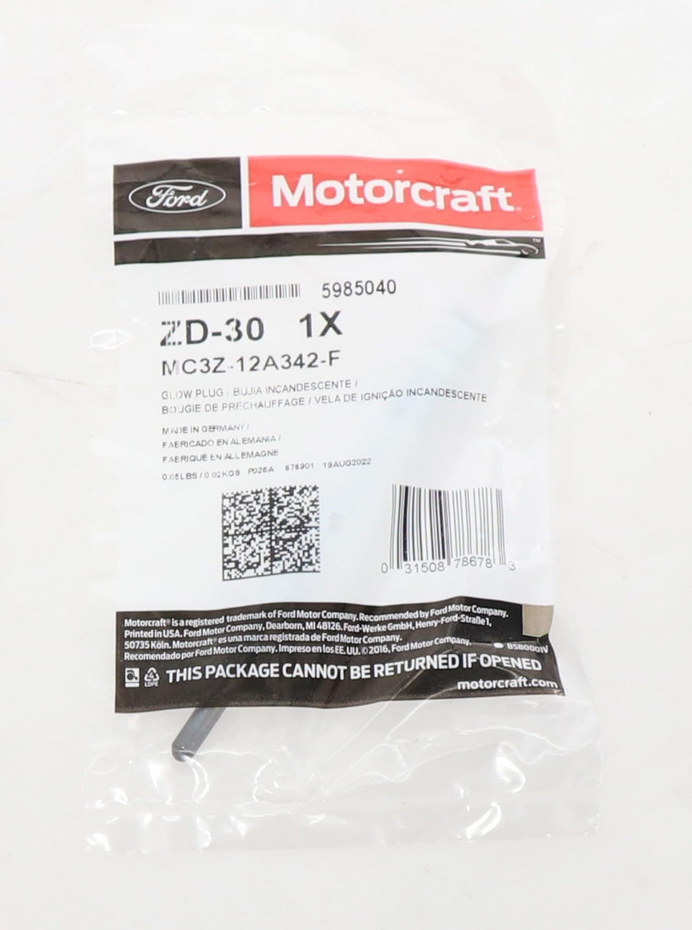 Eight Motorcraft glow plugs laid out to show complete set benefit for servicing all cylinders