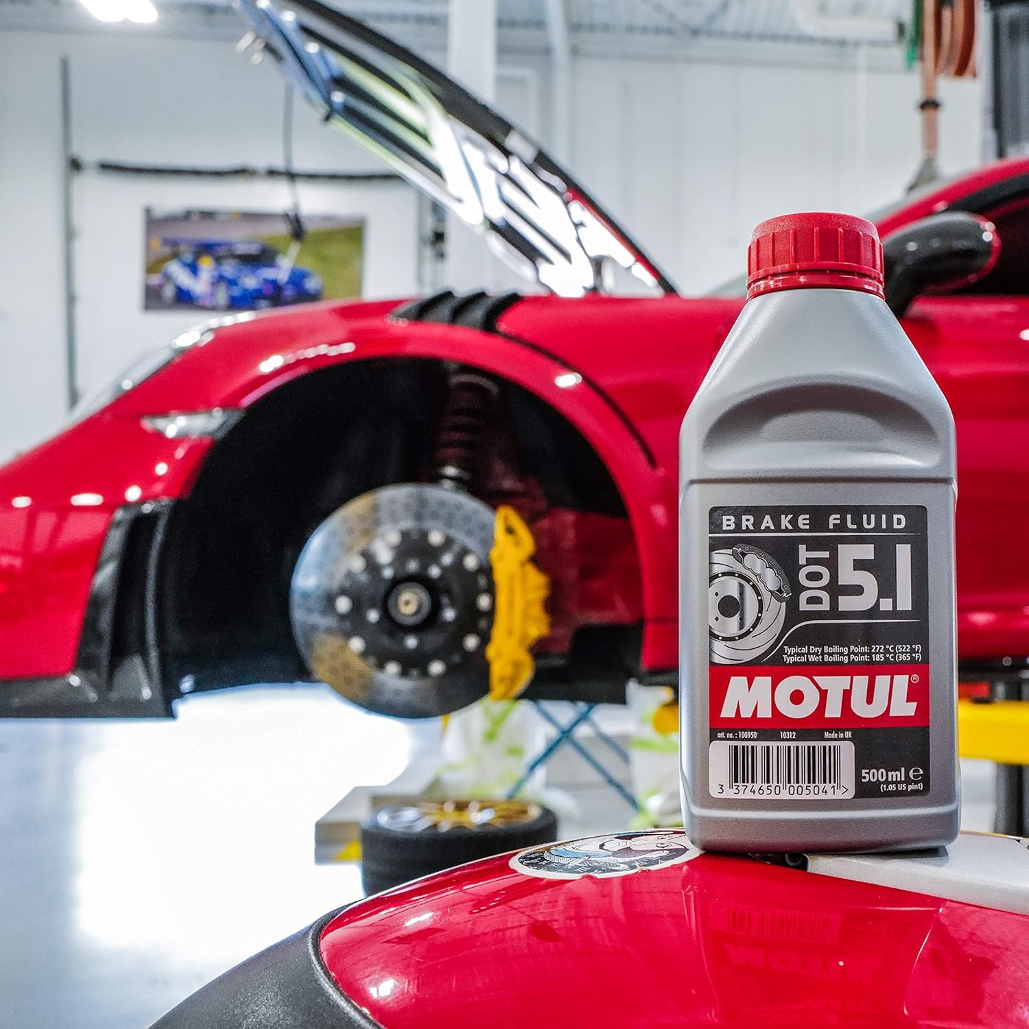 Motul DOT 5.1 label closeup with specs, highlighting boiling point and compatibility benefits