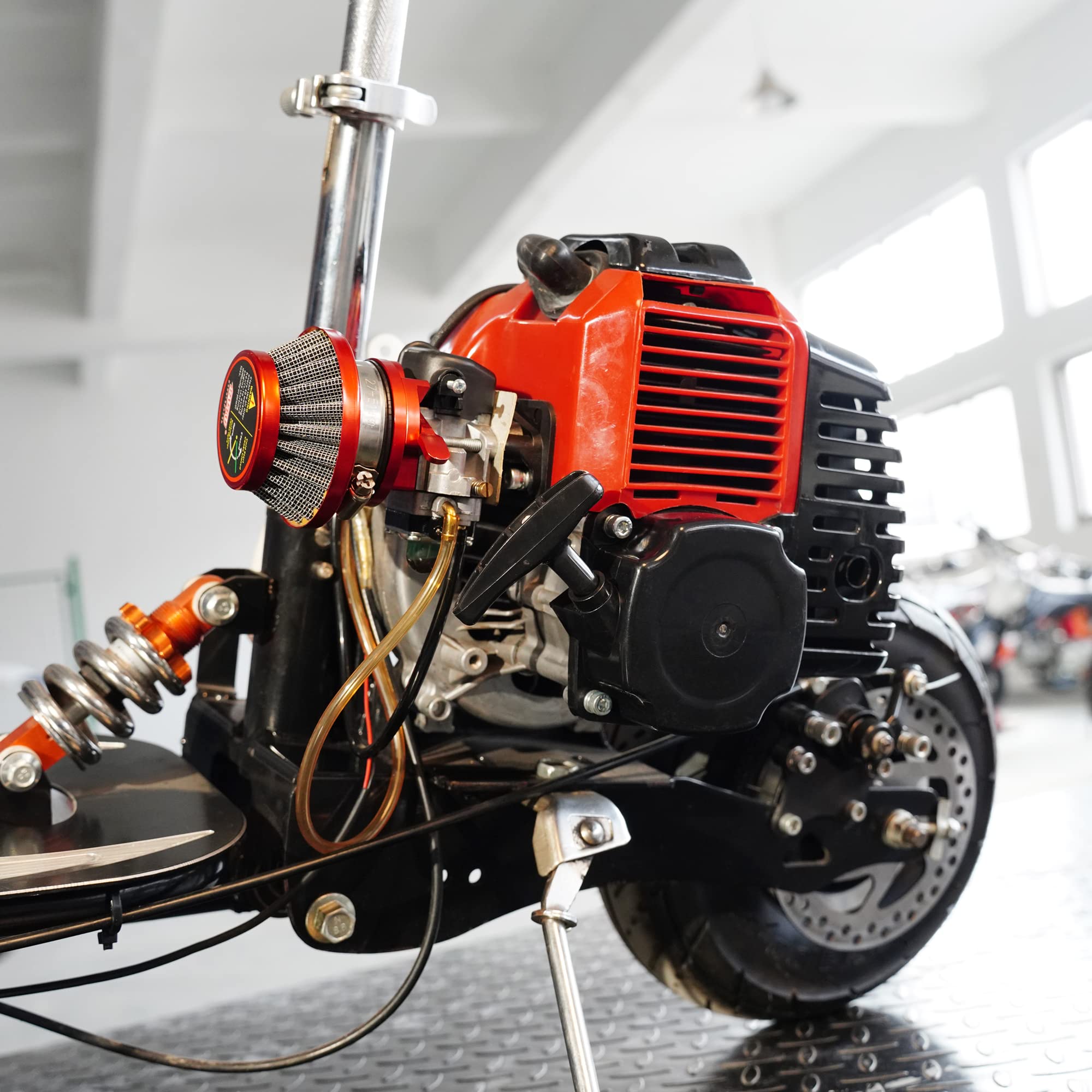 MTATCN starter beside a pocket bike for size comparison to check fit and scale