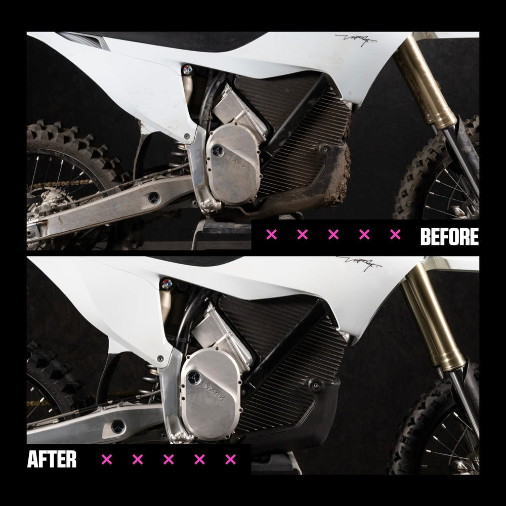 Muc-Off applying cleaner to motorcycle in garage for efficient degreasing