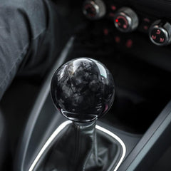 muge racing side profile mounted on shifter demonstrating ergonomic grip advantage