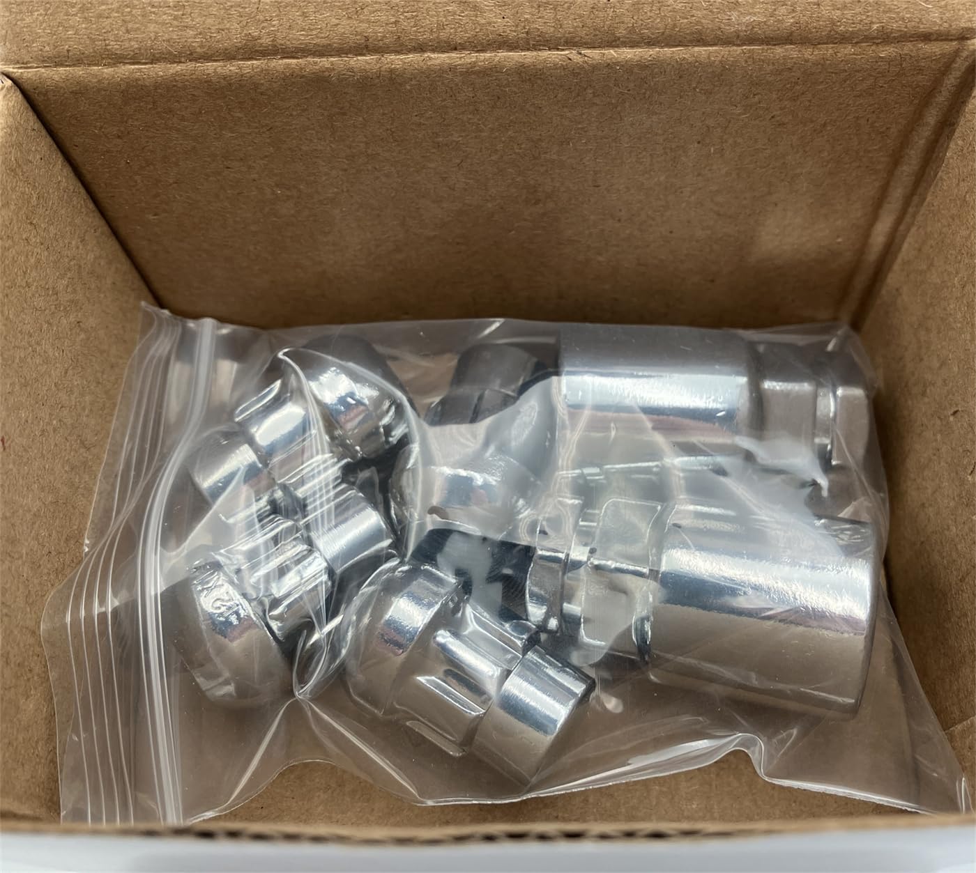 Mysttoo lug nut kit in garage scene showing practical use and improved wheel protection