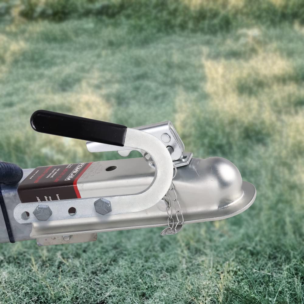 NBJINGYI coupler in use during trailer hookup beside a vehicle illustrating real-world use