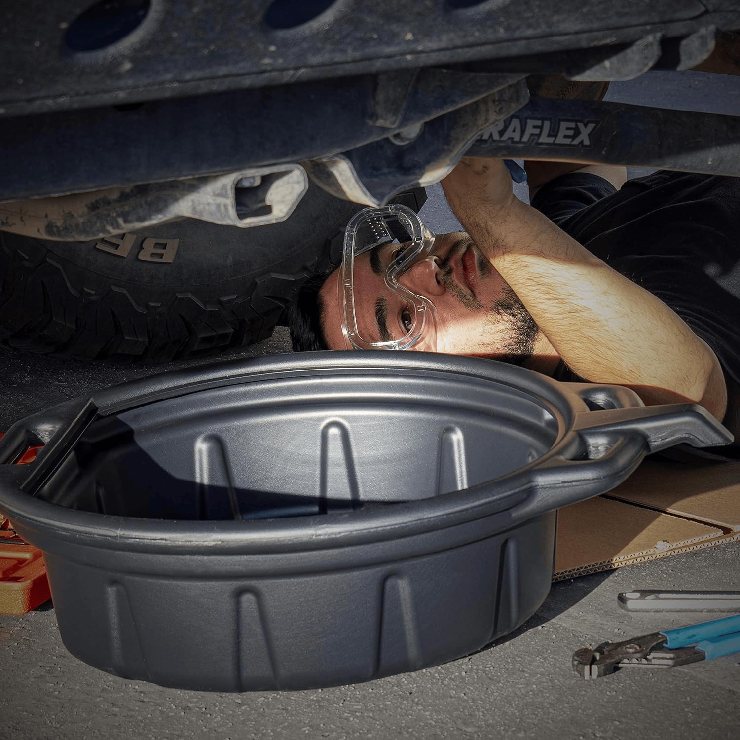 NEIKO pan positioned under vehicle illustrating low-profile fit
