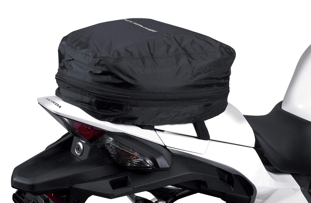 Nelson-Rigg interior lining and self-fastening strap to stabilize gear