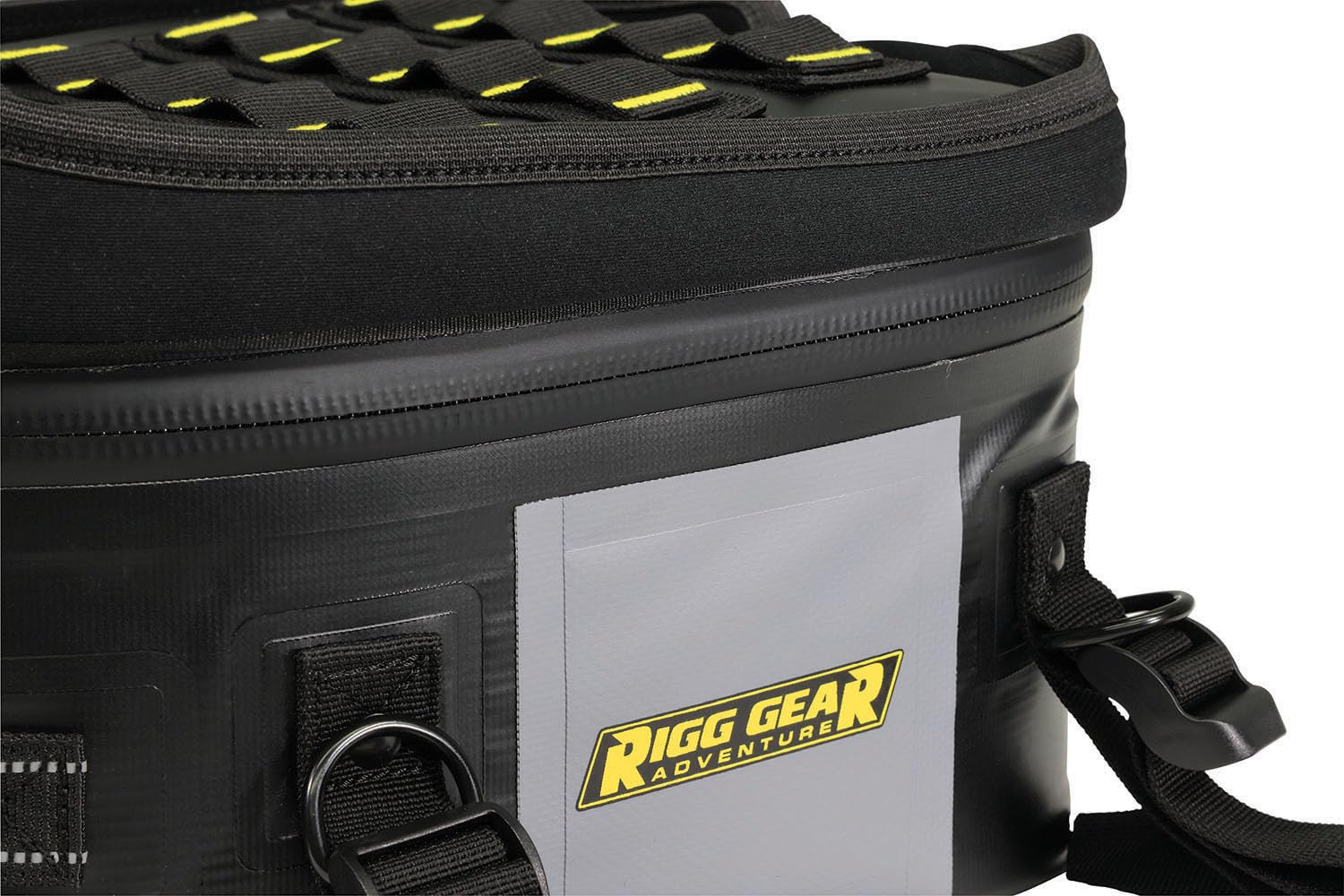 Nelson-Rigg tail bag size comparison next to helmet to show 12L capacity