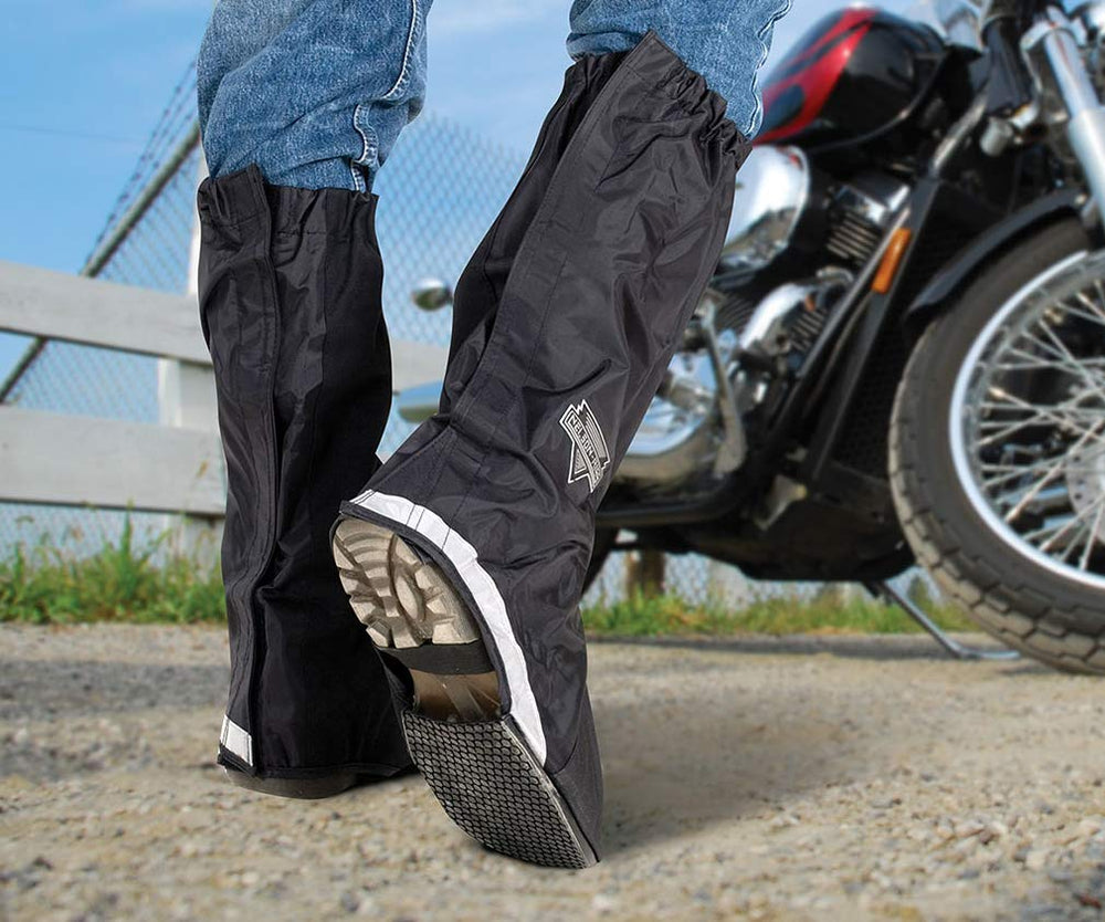 Nelson-Rigg boot covers in use on a motorcycle for dry, visible footwear