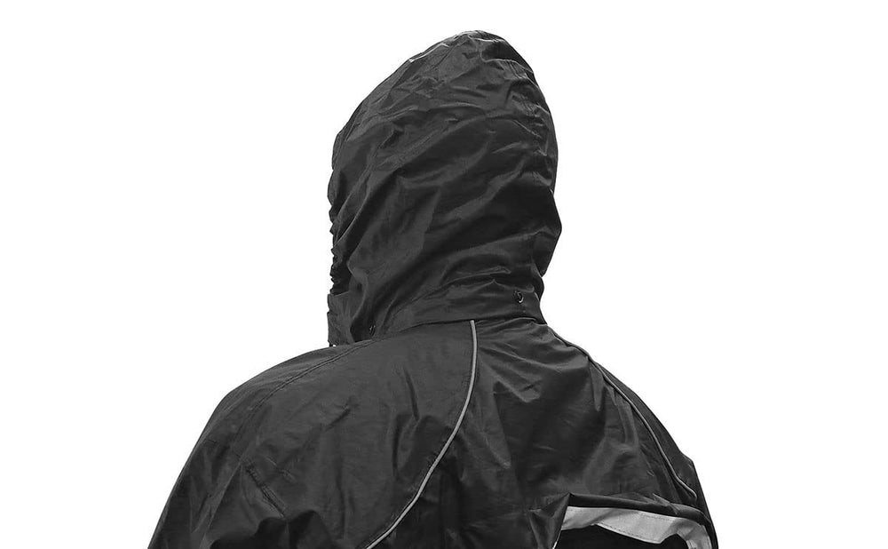 Nelson-Rigg full rain suit worn on motorcycle demonstrating coverage