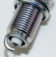NGK spark plug installed in engine illustrating correct placement and reliable ignition