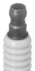 NGK spark plug installed in engine showing proper fit and improved ignition benefit