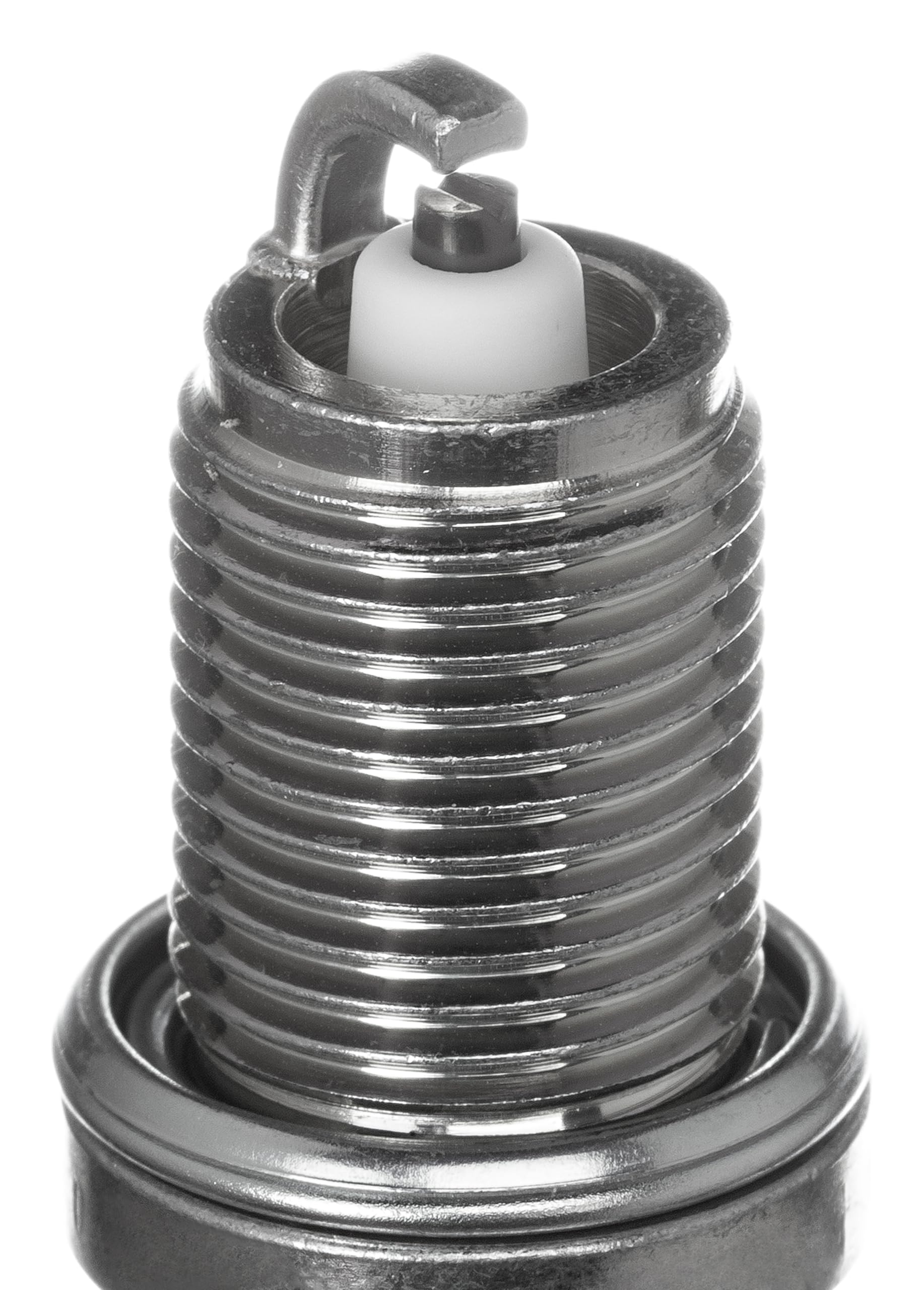NGK spark plug beside ruler for scale showing correct reach and fitment benefit