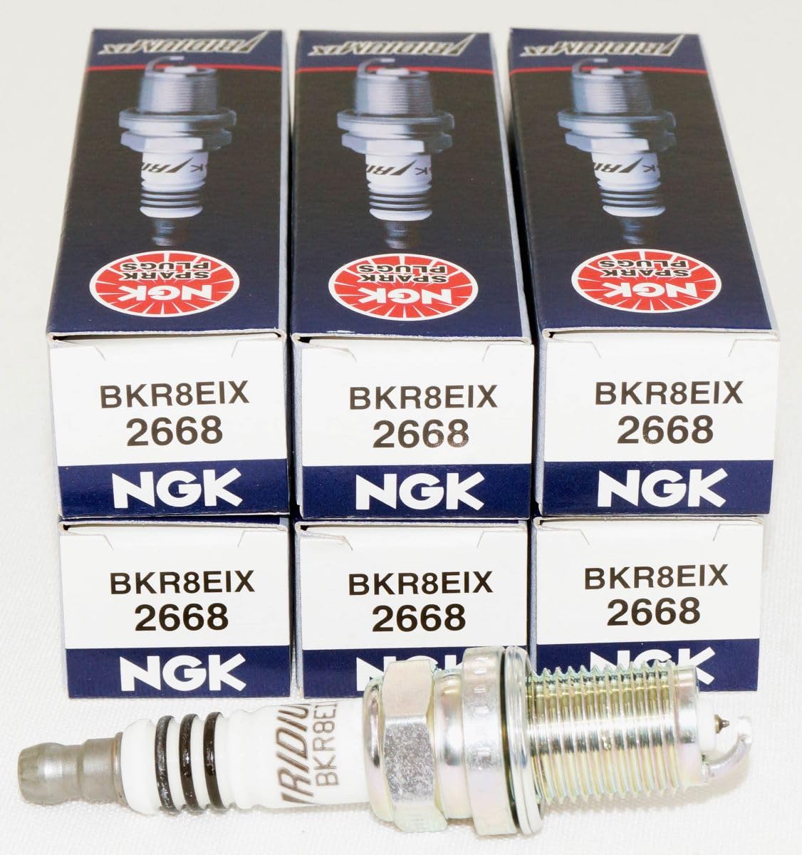 NGK BKR8EIX six-pack front packaging showing part number and benefit of OEM quality