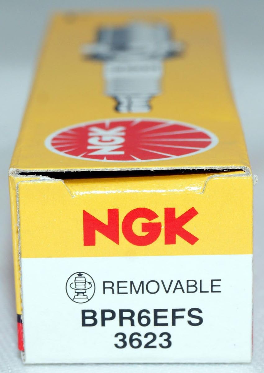 NGK BPR6EFS fitted in marine inboard engine showing corrosion-resistant fit